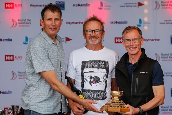 Jo Richards (center) and Duncan Deboltz (right) receive the Gold Roman Bowl from record breaking global sailor Brian Thompson – photo Paul Wyeth