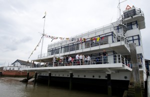 Party time on the balcony of the Royal Corinthian Yacht Club – photo Graeme Sweeney/JCC